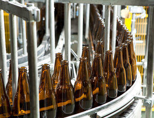 Brown glas bottles in a beverage bottling plant